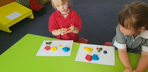 Mixing colours with playdough
