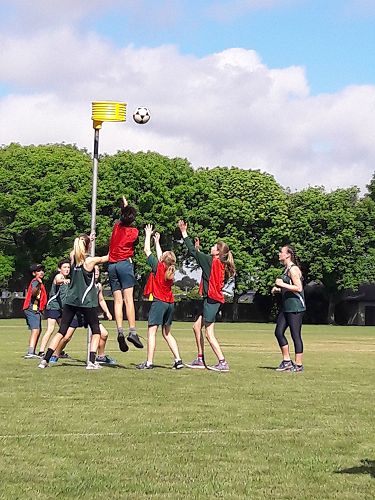 Fighting for a rebound at the summer korfball tournament held at Elmwood Park
