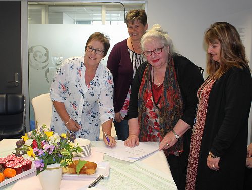 Lysette Riley from CYF signs MoU