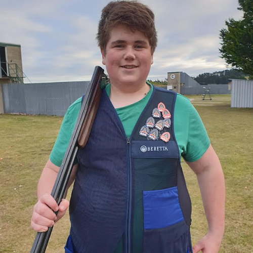 Jackson Stevens proudly wearing his medals won at The Otago Provincial Clay Target Championships at Wednesdays training.