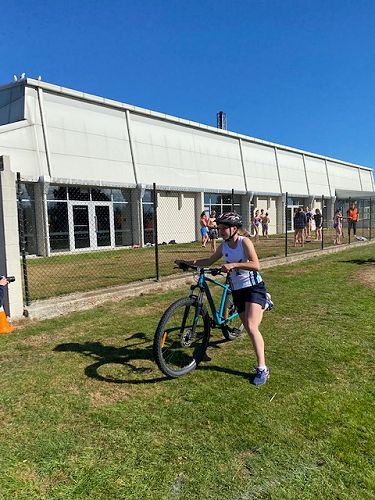 Matilda Sutton heading out to begin the 6km bike