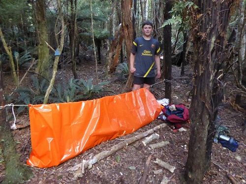 Travis making the bivy for a night on  his own