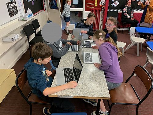 Senior students busy at work, Deaf hub