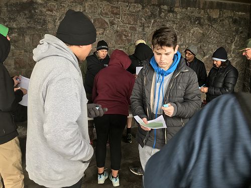 Planning with the map and GPS device (Left) Leslie Warbrick and Noah Kelly