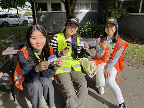 Gaeun Park, Rio Nakamura and Sakura Soga volunteering at the Aoraki Multicultural Festival