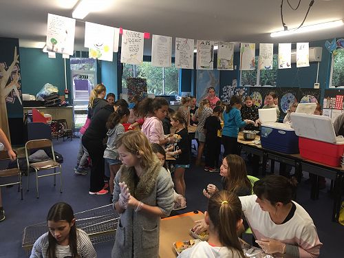 A production line for hangi parcels.