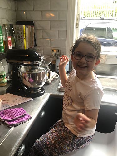 Florence Woodham (Year 2) mixing her pavlova ingredients