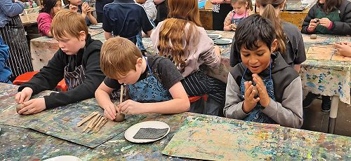 Oliver, Liam and Forbes enjoy making heads.