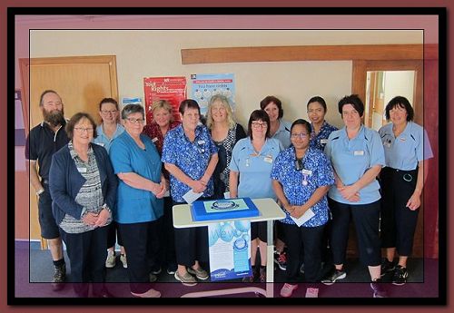 Staff at Resthaven Village celebrating the award