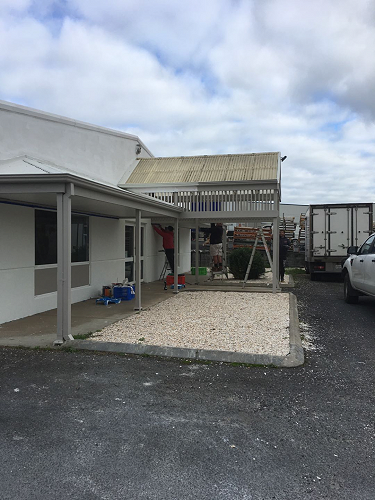 Busy re-painting the exterior of the Mt Gambier plant