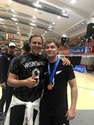 Mr Scott celebrates with Logan Wisnewski