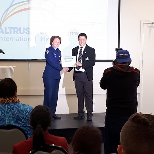 Tiaki Rhodes receiving his Altrusa Award