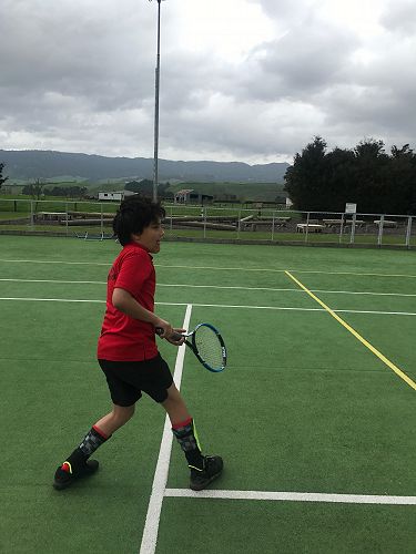 Playing Tennis with shin pads
