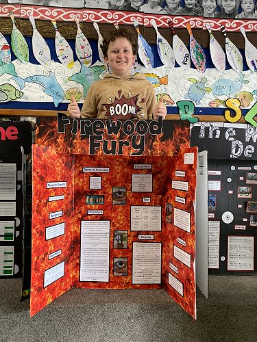 Zade and his school Science Project board