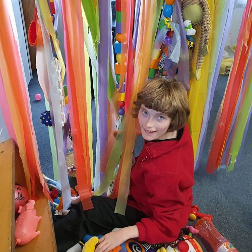 Charlotte spends time on the floor most days exploring the toybox.