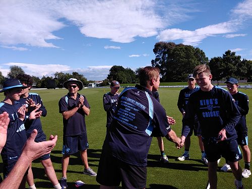 Jacob Murray receiving his King's Baggie from Rector Dan Reddiex on the ' Bert' at Lincoln.