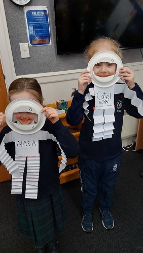 Caitlyn and Cate sharing their astronaut