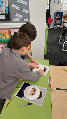George and Oliver Acklin creating their astronaut