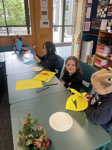 Years 0-3 making their creations.