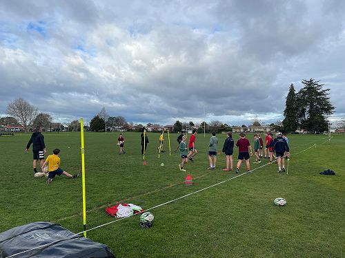 Mr Hodder coaching rugby drills