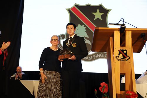 Dux of 2023, Alex Liu, with Mrs Ann Bennett