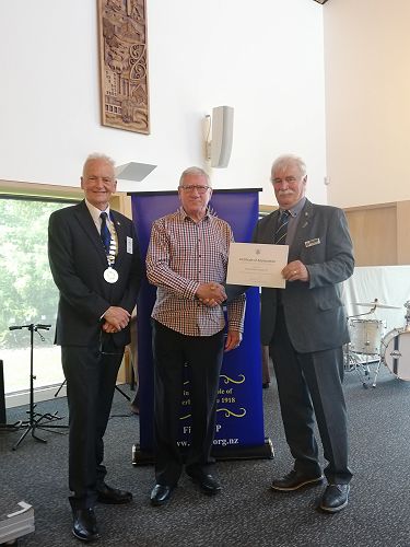 Barrie Cooper receiving his 40-year service certificate from Graeme Barber and Southern Regional Rep Lindsay Dow.