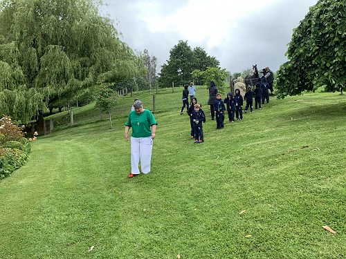 Mrs Duthie and children after meeting Toby, one of Harriet's horses