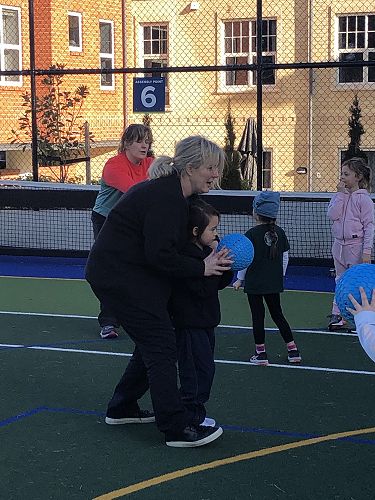 Coach Jo helping to improve technique
