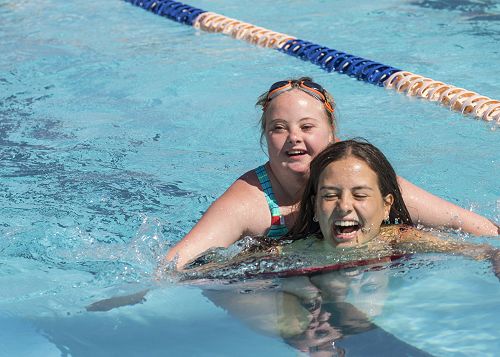 Meghan Phillips and Sarah Waldron enjoying the piggy back race