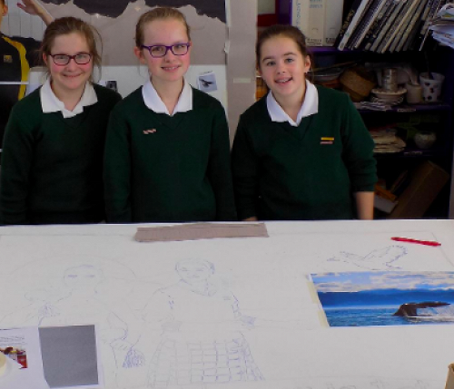 Olivia, Kate and Amy drawing out the design.