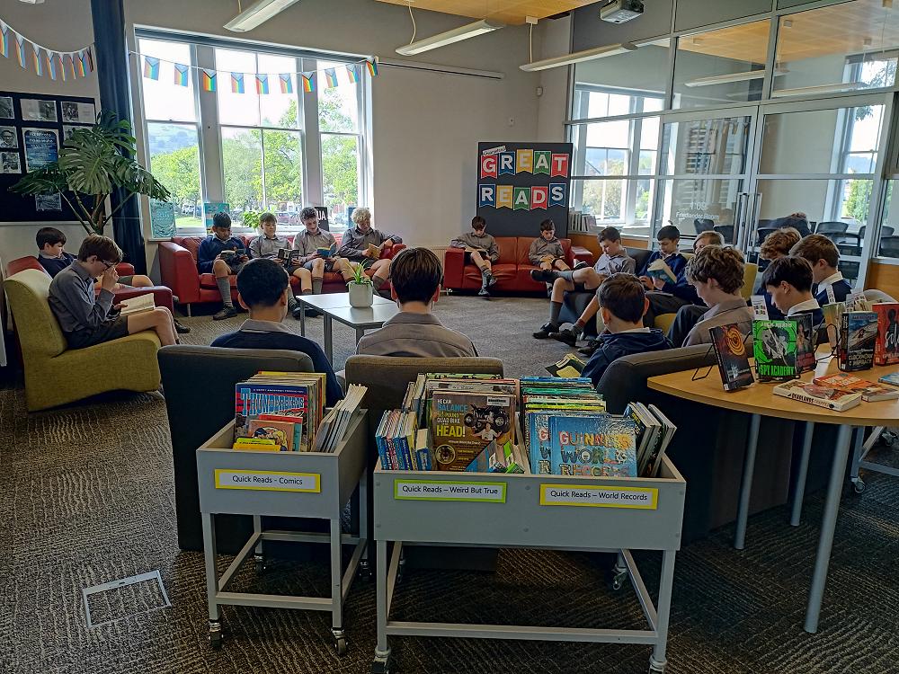 8AHO enjoy the new library layout during their weekly library visit.