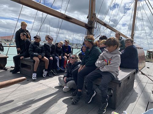 On the Waka Hourua listening to a speaker