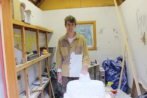 Year 12 sculpture student James Lawson alongside his work in progress!