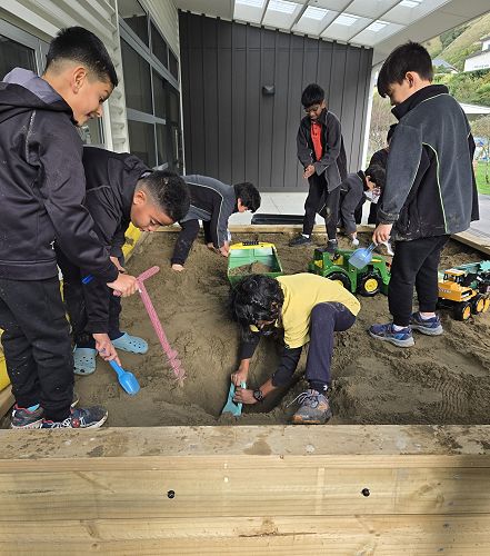 Our new sandpit, getting a good run for its money