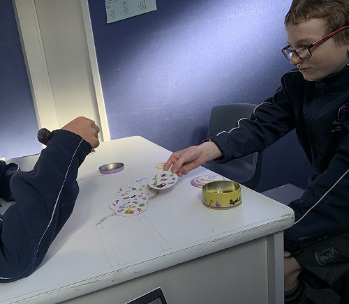 Jordan playing a cooperative game of Spot It