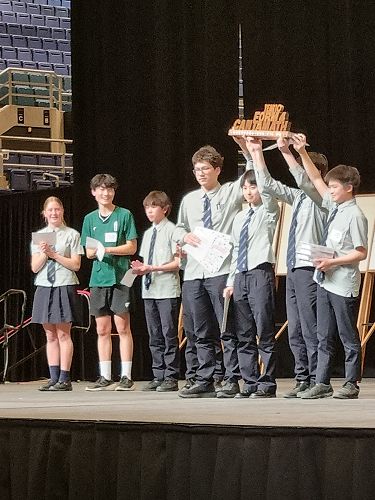 The Year 10 teams on the stage at Cantamath