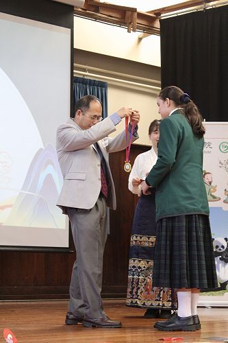 Ayesha receives the Chinese Calligraphy 1st Place Award