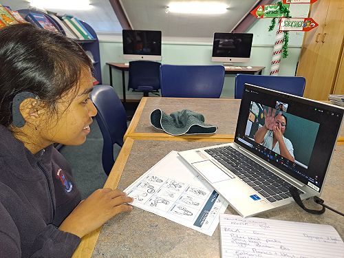 Cloe is learning lots of new signs with Deaf Mentor, Janice
