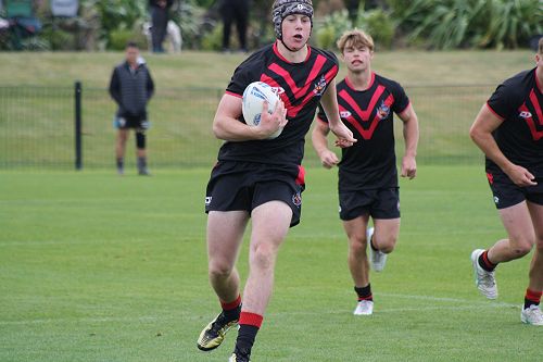 Jack Higginbottom carries the ball at the Canterbury Secondary' Schools' Rugby League competition.