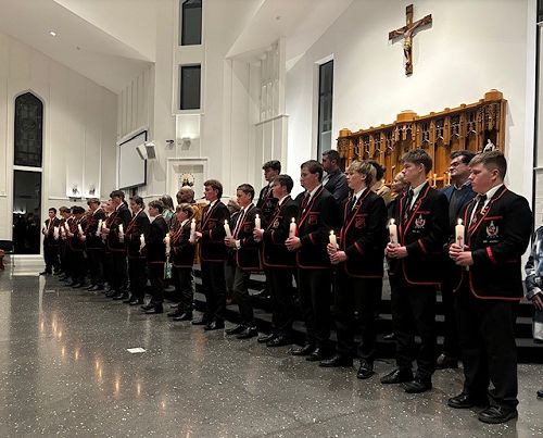 Students with their Baptism candles.