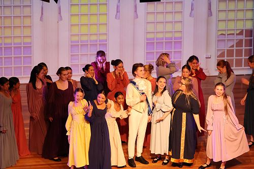 Prince Eric with all the princesses at the contest