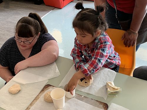 Olivia and Raiden baking at Sumner