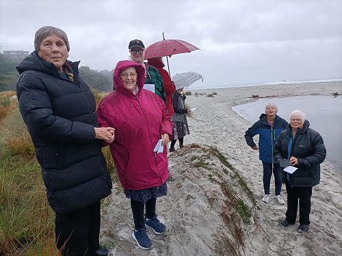 St Margaret's Brighton gathers on the beach on Easter Sunday