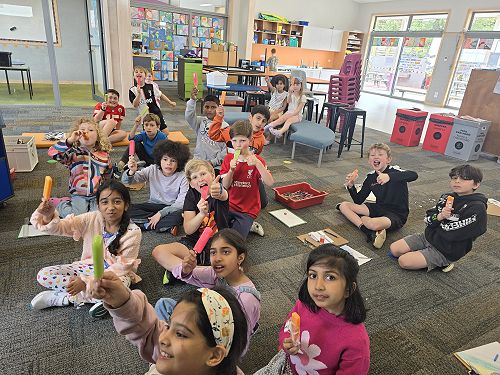 Kākā enjoying their 'Read-a-Thon' treats.