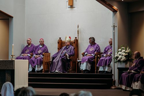 Bishop Richard delivering his homily from the cathedra