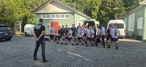Coach Tony receiving a birthday haka