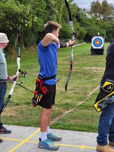 Leo Schollum competes in Archery