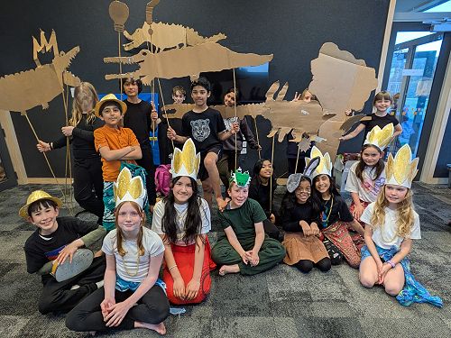 Year 5/6 students representing Cambodia. They told us a story through puppets.