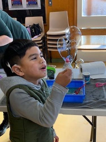 Hikairo creating bubbles at KIT Day