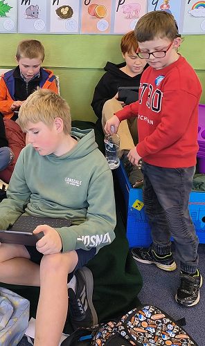 Fletcher, Kolton, Matty and Jacob researching and looking for facts to share.